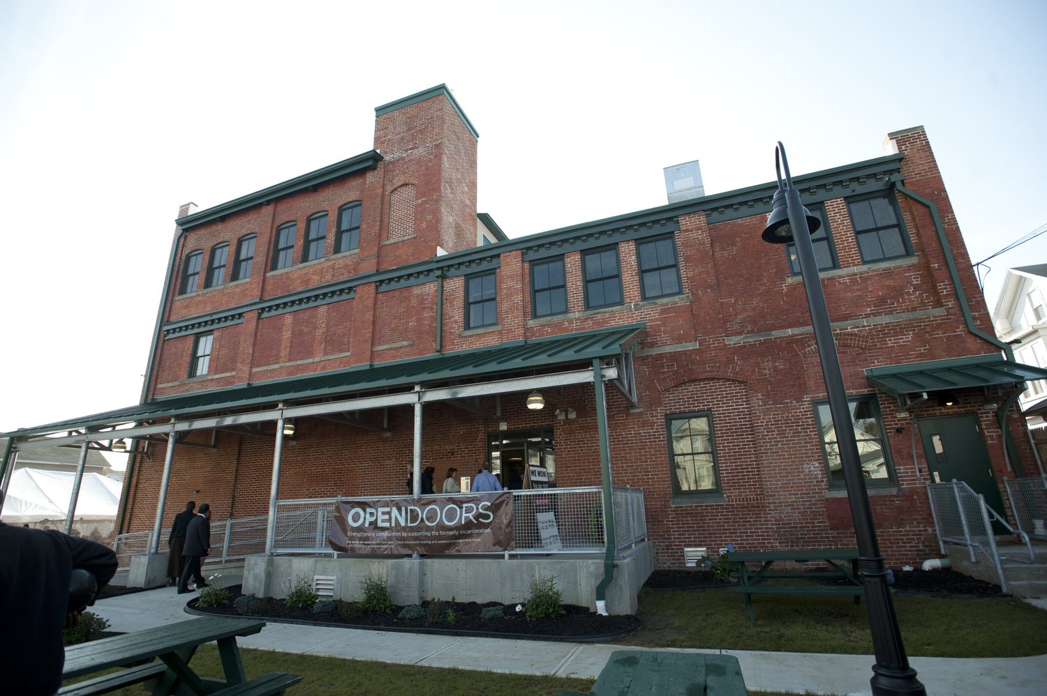 OpenDoors building in Providence with an OpenDoors banner on the porch