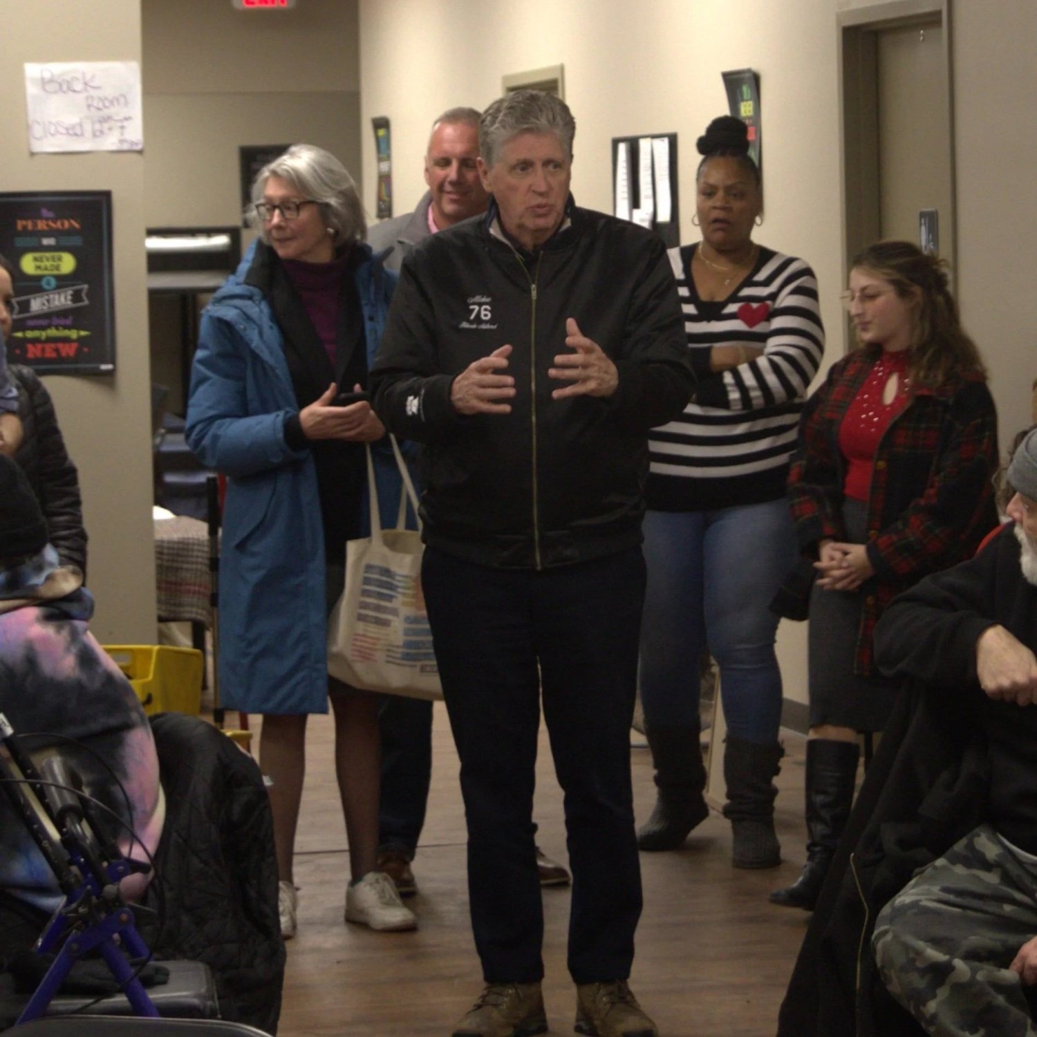 Governor McKee speaking with residents and staff at the renovated Pawtucket shelter
