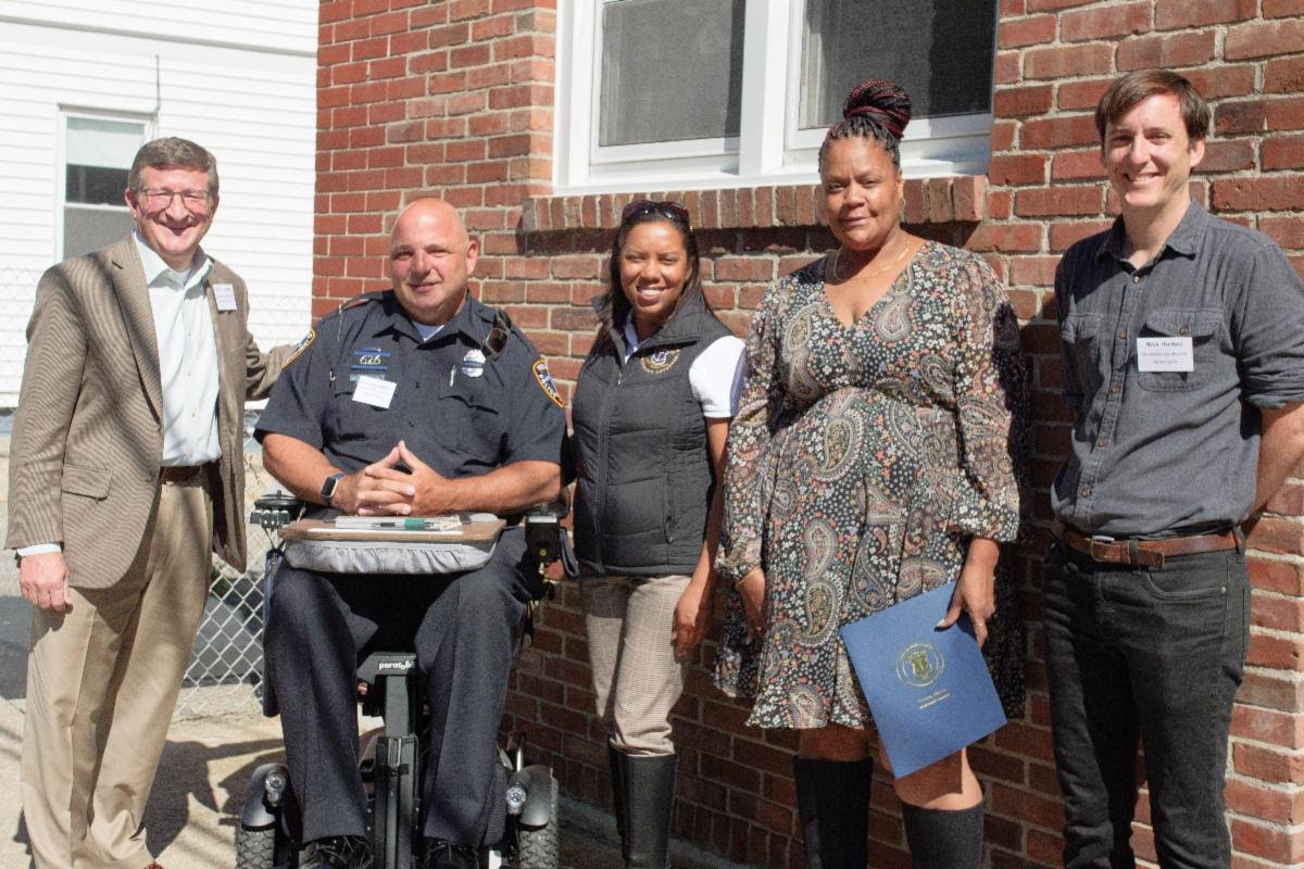 Five people outside the new OpenDoors house for women released from prison