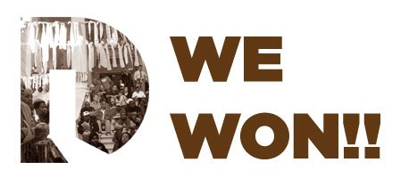 We Won!! graphic with a crowd photo inside the OpenDoors logo shape